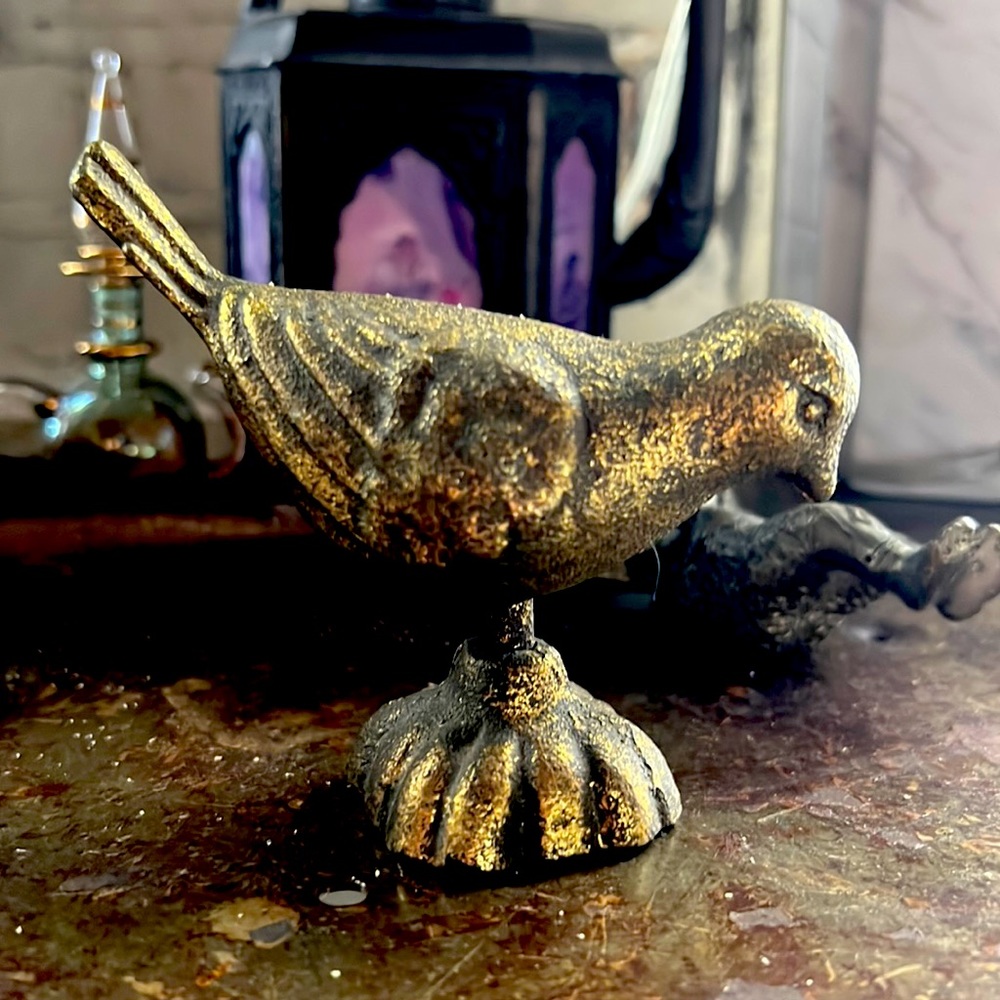 Bronze bird statue
